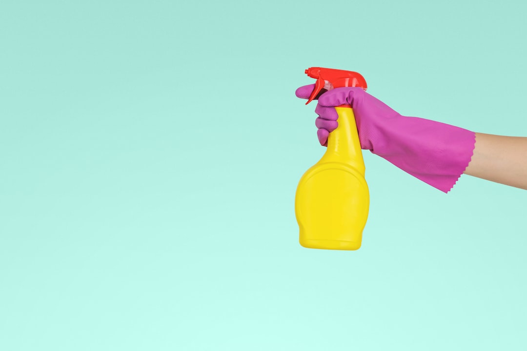 hero-img-02 person-holding-yellow-plastic-spray-bottle-zmnefoi3k